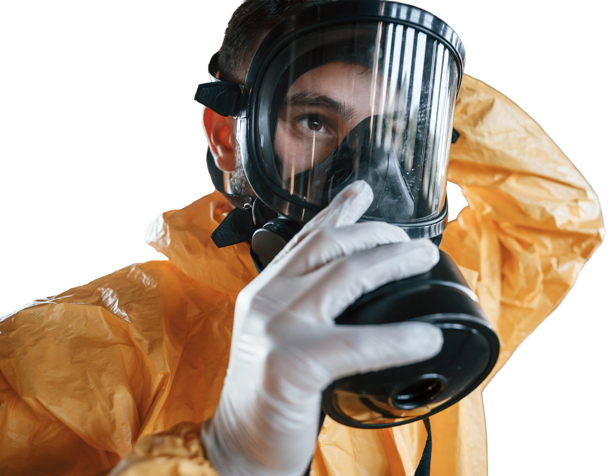 Person wearing gas mask and suit